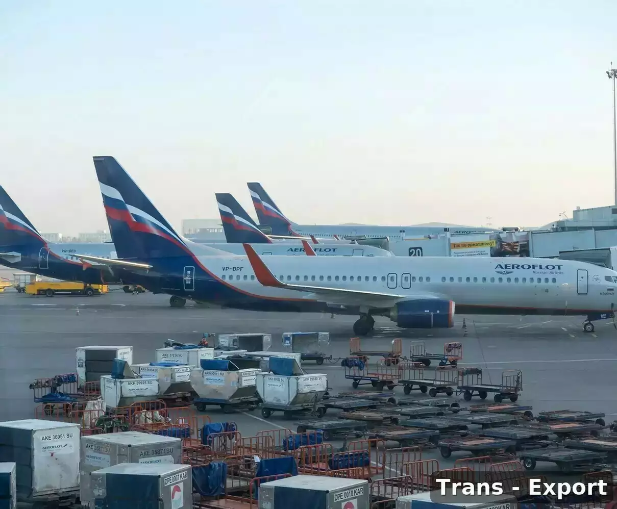 самолеты погружают контейнеры
